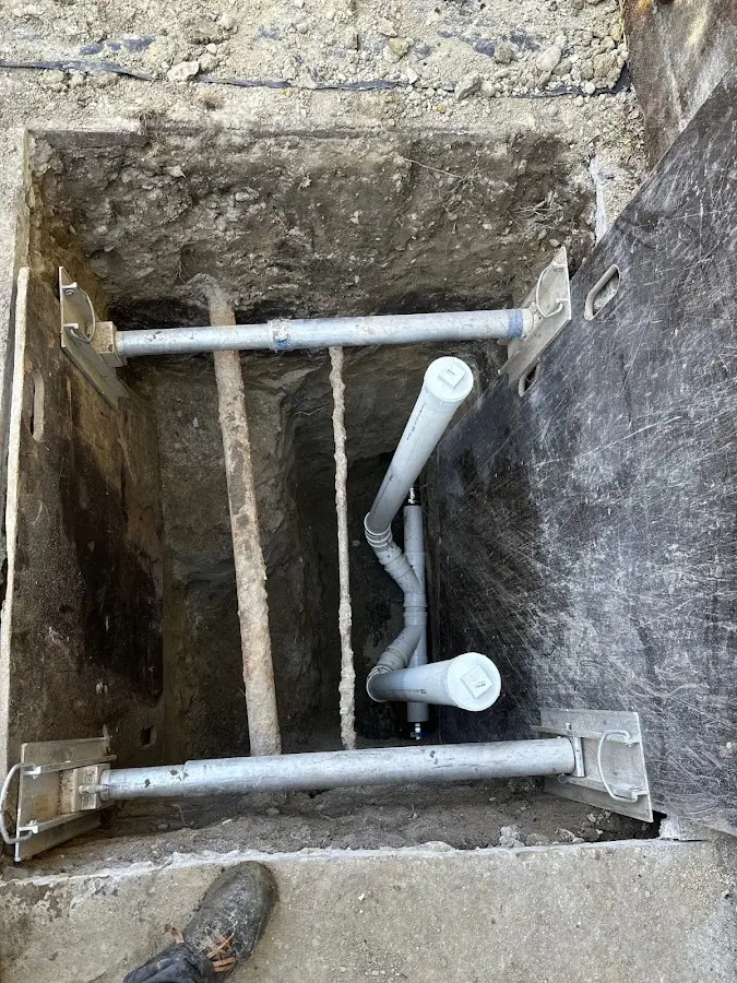 Experienced plumber completing Backflow Testing work in International Falls